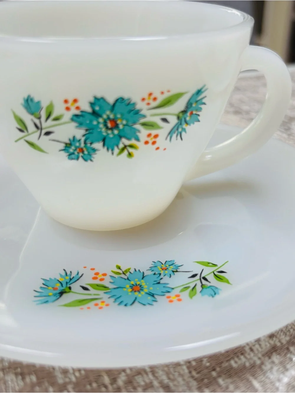 Vintage Fire King Milk Glass Teacup and Saucer Set with Turquoise Floral Accent
